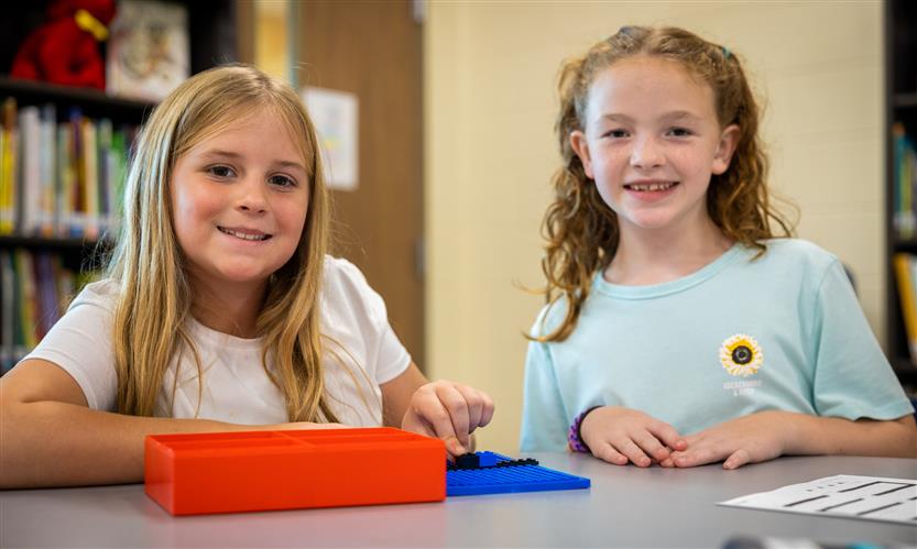 Students use robots in library